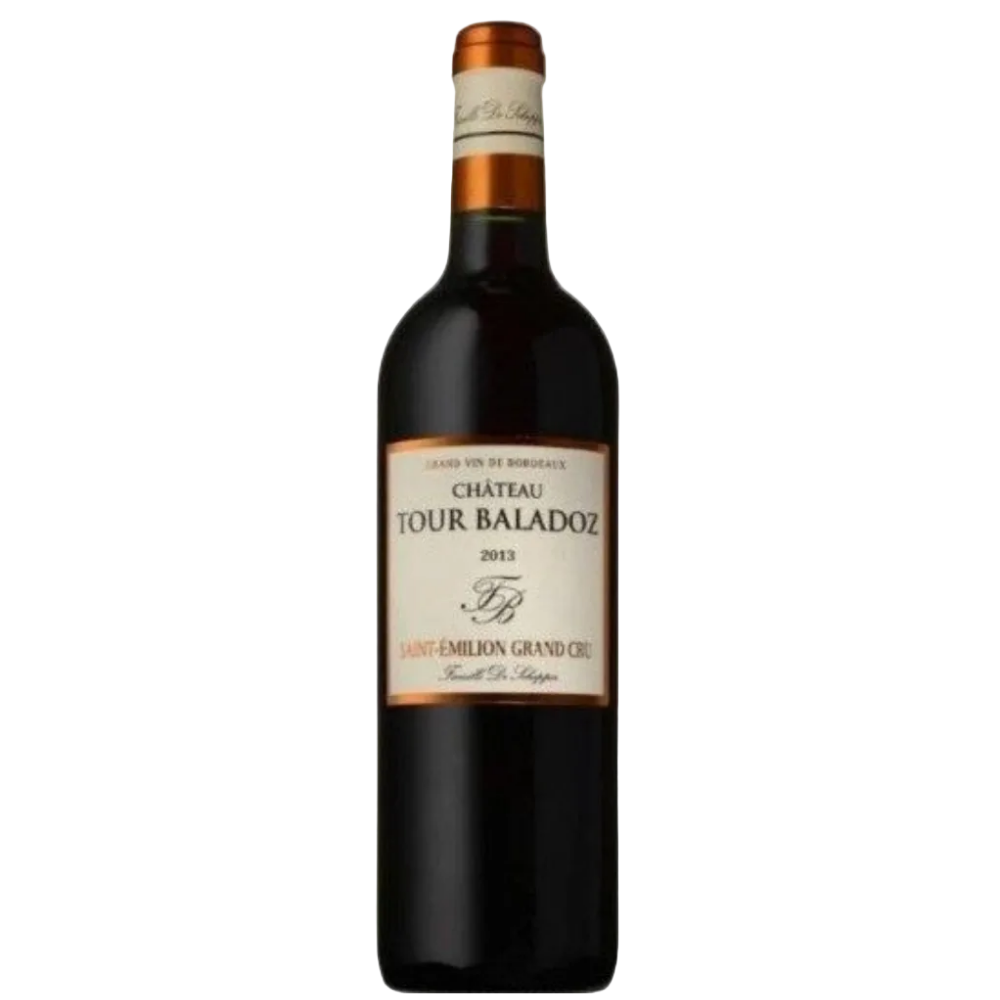 A bottle of Château Tour Baladoz 2013 red wine, featuring a dark glass bottle with a cream-colored label and a copper-colored foil seal at the neck, set against a plain white background.