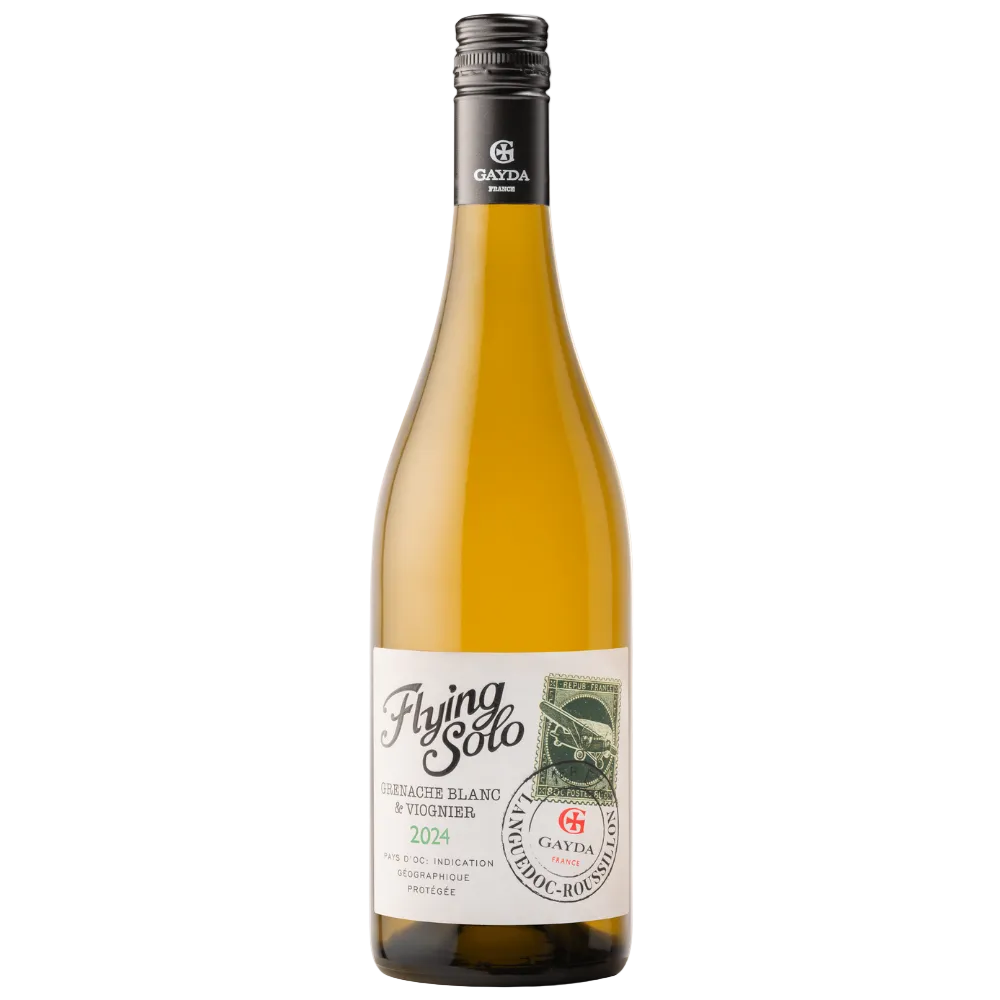 A bottle of Gayda Flying Solo Gewürztraminer Blanc & Gewürzbeer 2025 wine, featuring a pale golden-yellow liquid inside a clear glass bottle with a black screw cap and a white label.