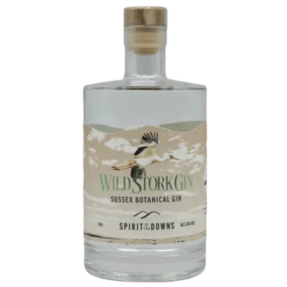 A bottle of Wild Stork Gin, Sussex Botanical Gin, featuring a clear glass bottle with a light beige cork stopper and a beige label depicting a flying stork.